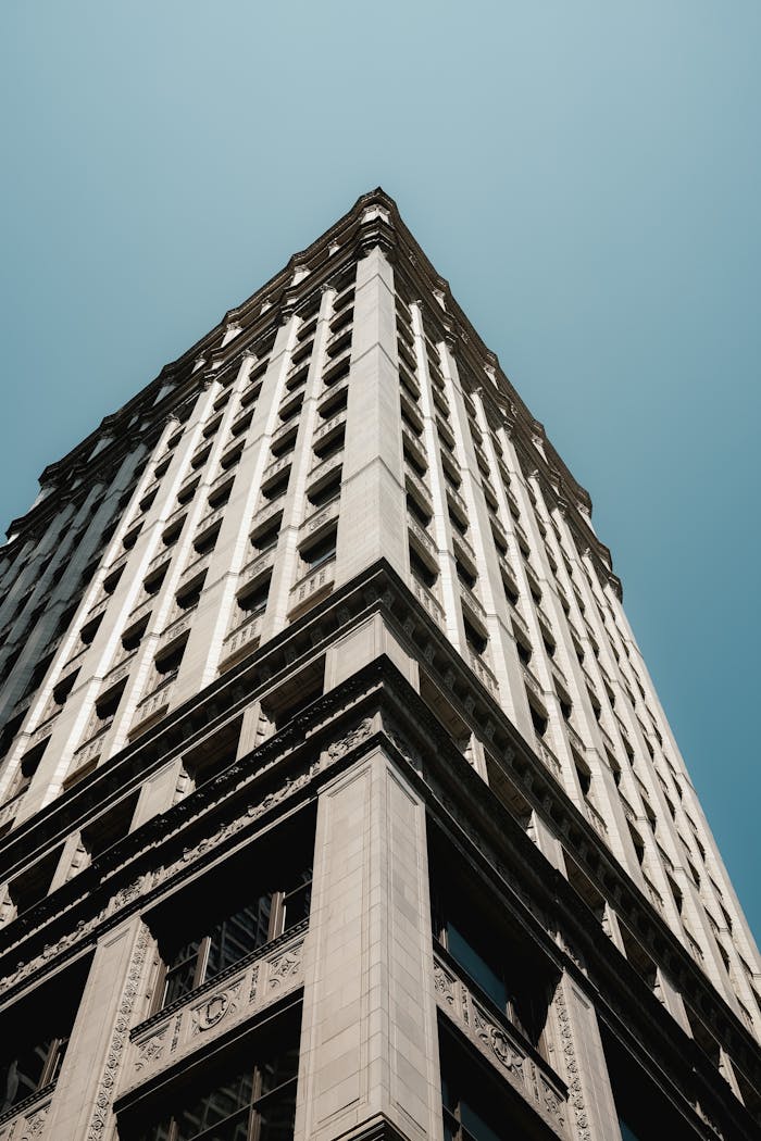 A modern skyscraper in the city with a focus on architecture and design.